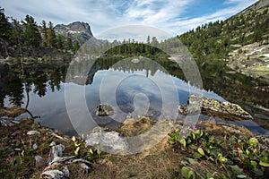 Mountain is very clean and clear lake. Magnificent summer landscape in the mountains