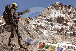 Mountain View and Alpine Climber taking Picture on Mobile Telephone