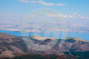 Mountain view from dron on sea, sky with clouds, island. Landscape drone photo. summer holidays in Europe. Sea scape. photo