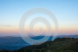 Mountain view with moon in morning