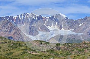 Mountain view. Rocky peaks, glaciers, treeless. Traveling in the mountains