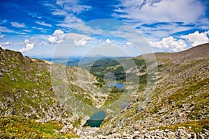 Mountain view with small lakesand forest