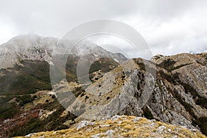 Mountain view with thick clouds down to the lowland