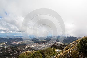 Mountain view with thick clouds down to the lowland