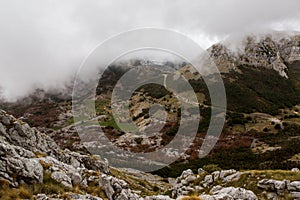 Mountain view with thick clouds down to the lowland