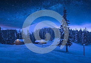 Mountain village in high mountain valley under the starry sky