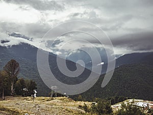 Mountain village during rain, cloudy and foggy weather