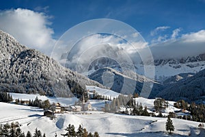 Mountain village in the snow in winter