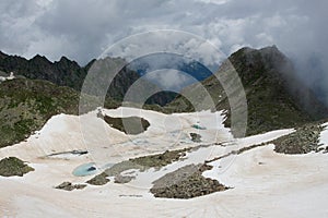 Mountain walley with frozen lake.