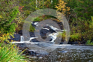 Mountain waterfall. fast stream water