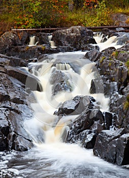 Mountain waterfall. fast stream water