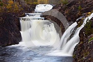 Mountain waterfall. fast stream water