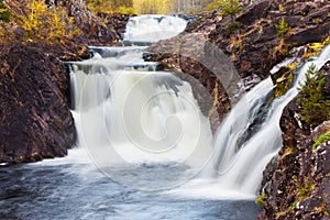 Mountain waterfall. fast stream water