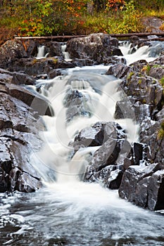 Mountain waterfall. fast stream water