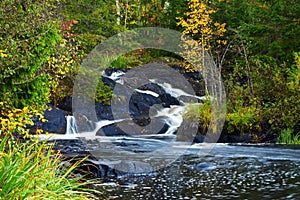 Mountain waterfall. fast stream water