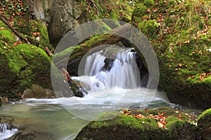 Mountain waterfall. fast stream water