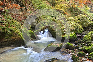 Mountain waterfall. fast stream water