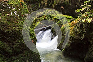 Mountain waterfall. fast stream water