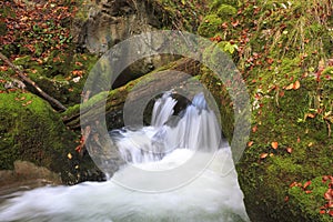 Mountain waterfall. fast stream water