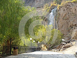 Mountain with waterfall and natural pool in Hammamat Ma`In Hot Springs, Jordan