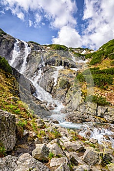 Mountain waterfall Siklawa in Polish Tatra