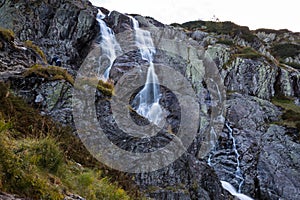 Mountain waterfall Siklawa in Polish Tatra Mountains. Tatra National Park