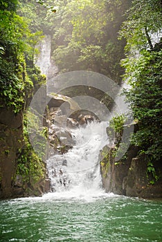 Mountain waterfall in Sunny day