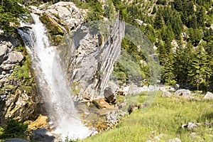 mountain and waterfalls in village theodorian arta perfecture greece firs forest high rocks butterfly