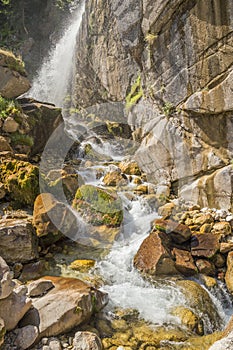 mountain and waterfalls in village theodorian arta perfecture greece firs forest high rocks butterfly