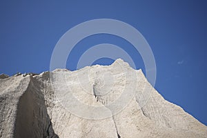 Mountain of white sand. A white mountain of white stones in Rummu Vasalema Estonia. The erosion from the quarry in the limestone q