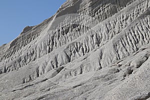 Mountain of white sand. A white mountain of white stones in Rummu Vasalema Estonia. The erosion from the quarry in the limestone q