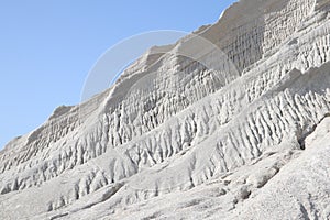 Mountain of white sand. A white mountain of white stones in Rummu Vasalema Estonia. The erosion from the quarry in the limestone q