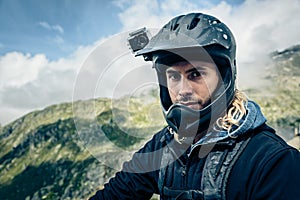 Mountainbiker With Actioncam On Helmet