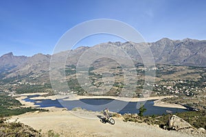 Mountainbiking above Lac de Calacuccia, Corse, France