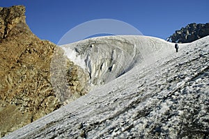 Mountaineer ascending a glacier.