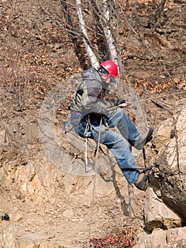 Mountaineer climbing up