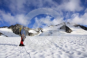 Mountaineer climbing up the Wedgemount Glacier in Garibaldi Park