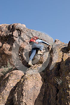 Mountaineer climbs to the top