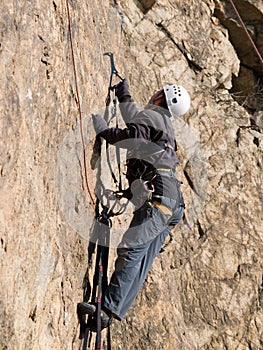 Mountaineer crawling on the wall photo