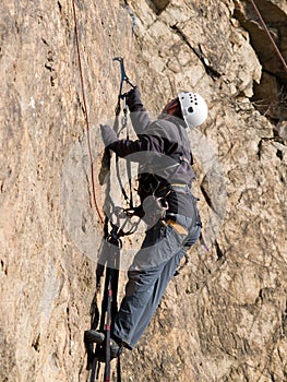 Mountaineer crawling on the wall