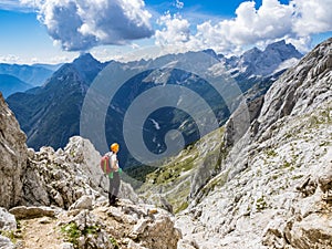 The mountaineer enjoying the view from the mountain