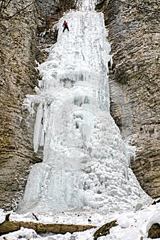 Mountaineer on frozen Brankovsky icefall in Slovakia