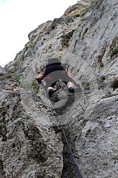 Mountaineer on Pittentaler Klettersteig