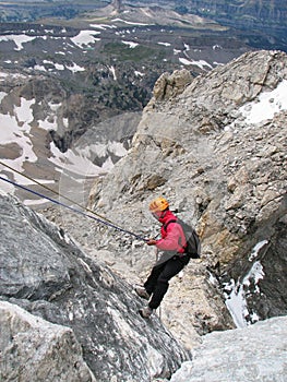 Mountaineer rappelling