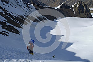 Mountaineer in a shadow