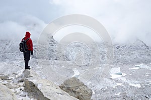 Mountaineer standing near Khumbu Icefall - one of the most dange