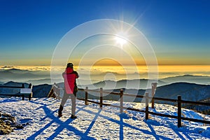 Mountaineer stands on the peak in Winter,Deogyusan national park