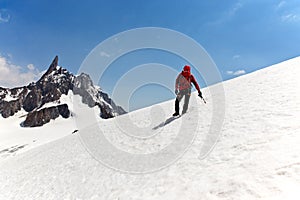 Mountaineer on the way for reach the summit