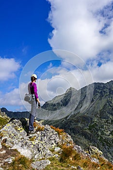 Mountaineer woman with helmet