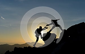 Mountaineering assistance on the rocks photo